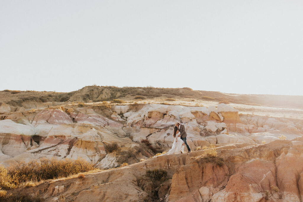 stunning couple during their beautiful boho elopement | Andrew & Chelsey's Beautiful Boho Elopement in Paint Mines, Colorado