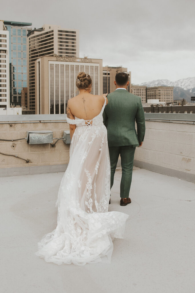 bride and groom doing a first look on a rooftop in salt lake city