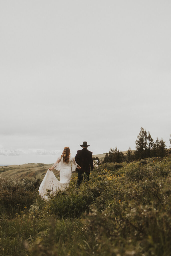 couple having a morning elopement in grand teton national park
