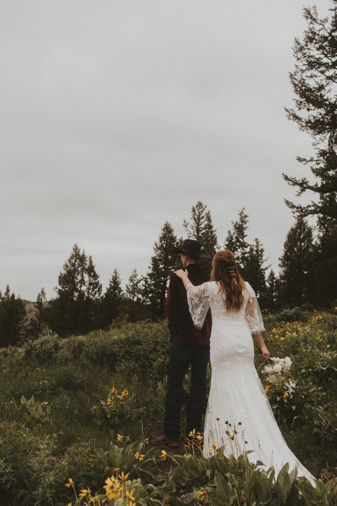 couple posing for their elopement photos in grand teton national park
