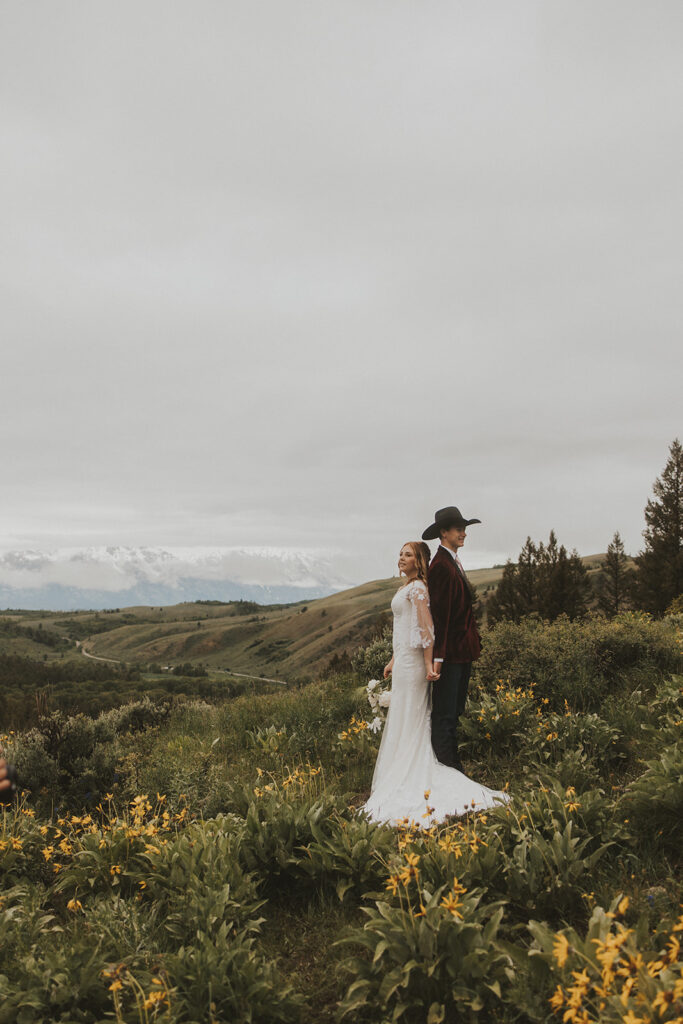 couple posing for their elopement photos in grand teton national park
