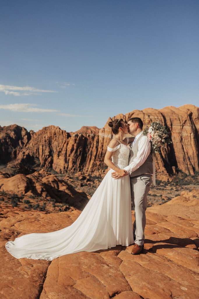 newlyweds posing in utah for their elopement photos
