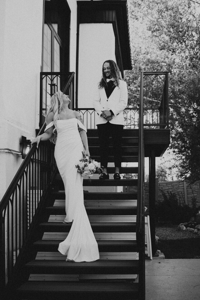 Black and White photo of the bride and groom looking at each other at their intimate wedding