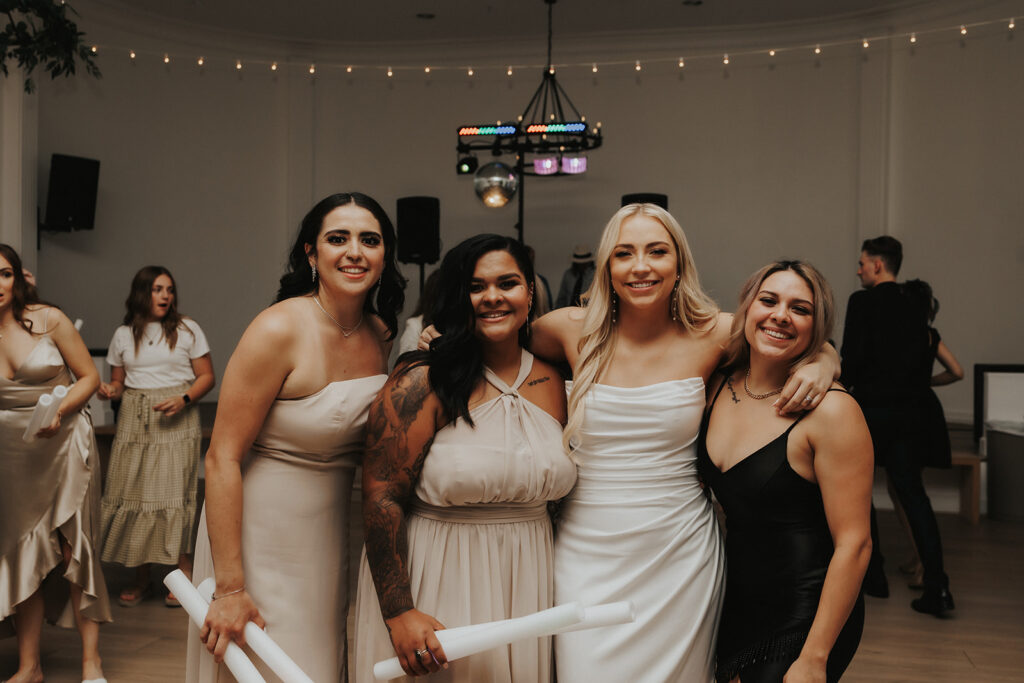 bride and her bridesmaids at the reception