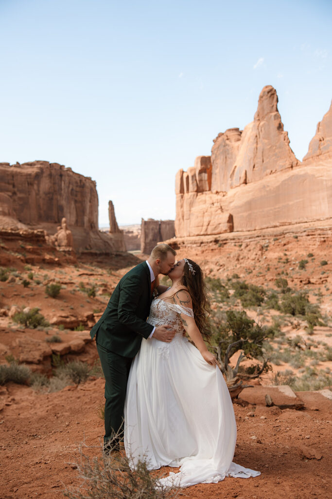 bride and groom kissing at their elopement 