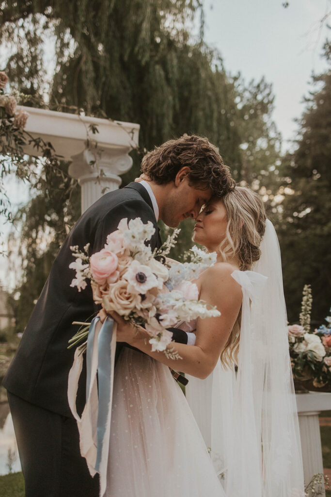 cute portrait of the bride and groom at their wedding reception