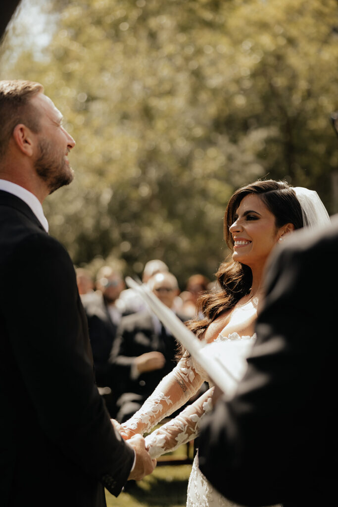 bride and groom exchanging vows