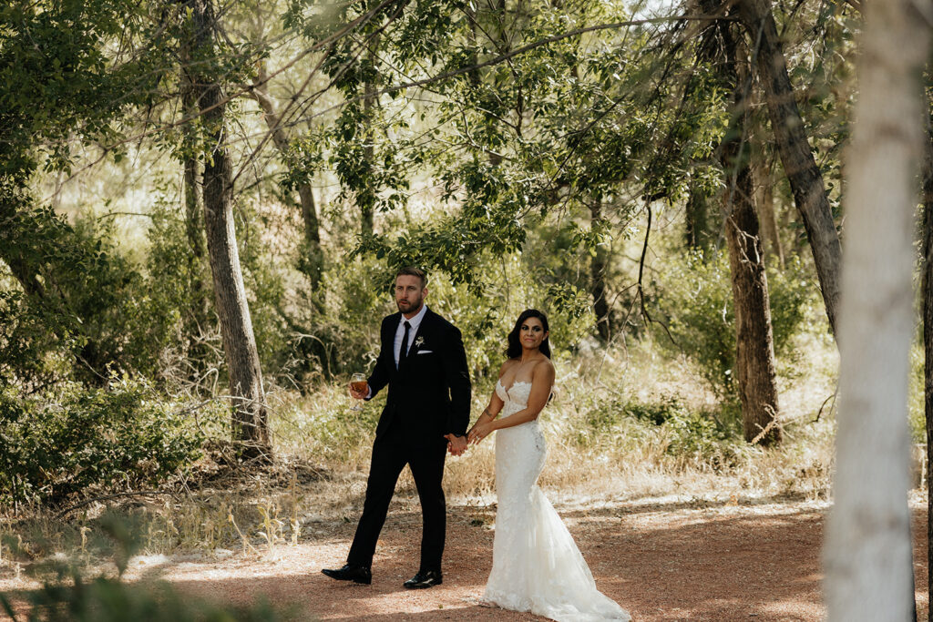 bride and groom arriving at their Elegant and Adventurous Wedding reception