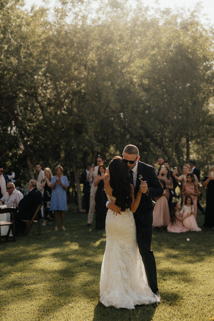 bride and groom first dance at their wedding reception