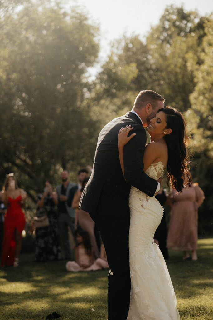 bride and groom dancing at their wedding reception