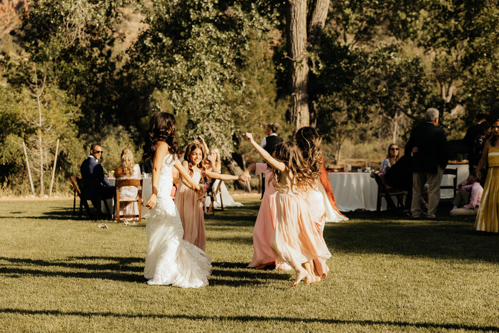 bride dancing with her friends at her Elegant and Adventurous Wedding reception