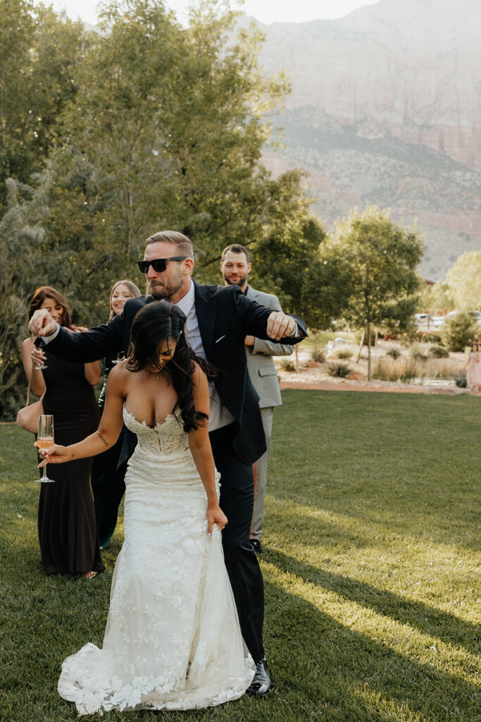 happy newly married couple dancing 