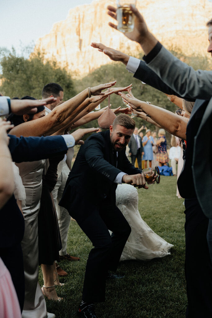 bride and groom leaving their wedding party