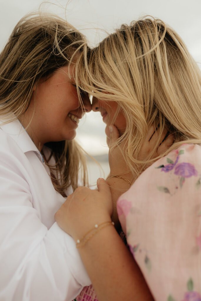 couple laughing with each other at their playful elopement 