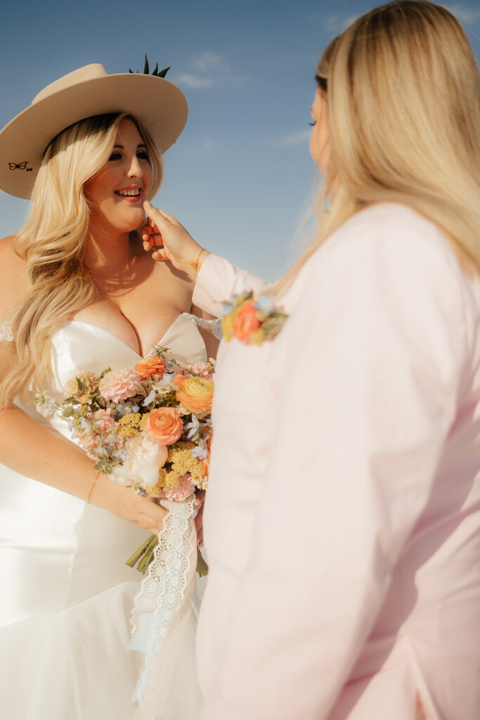 couple smiling at each other after their first look