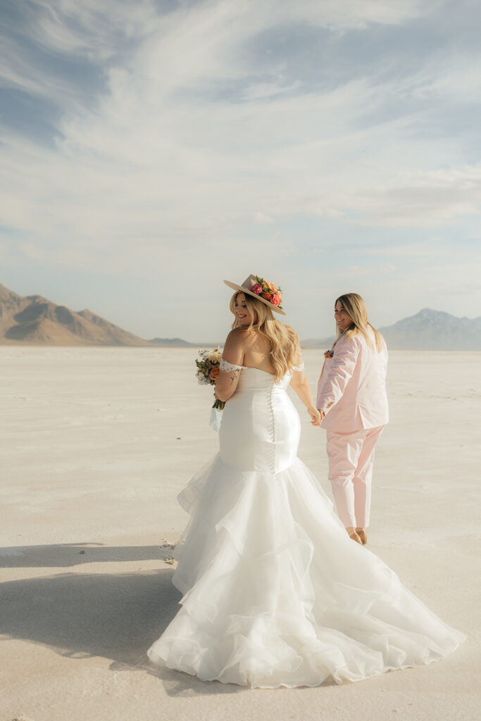 couple walking around bonneville salt flats