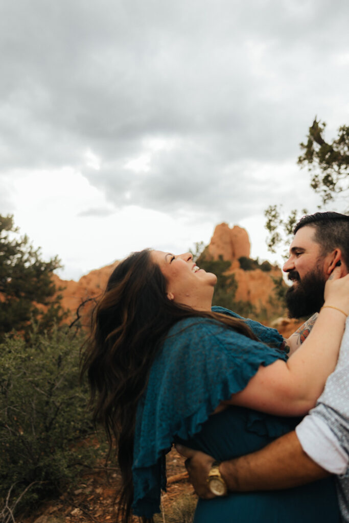 Adventurous & Candid Engagement Photos at Garden of the Gods, CO