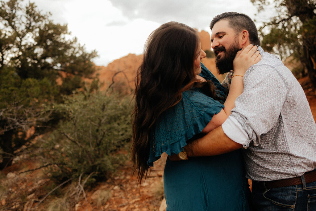 happy couple at their adventurous engagement session