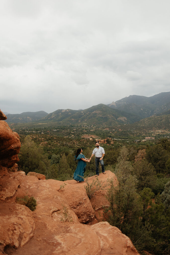 adventurous engagement photos at garden of the gods