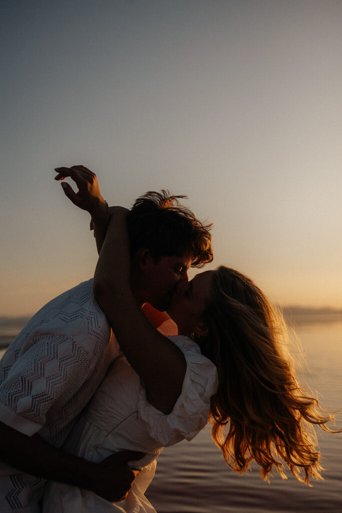 couple kissing during their photoshoot