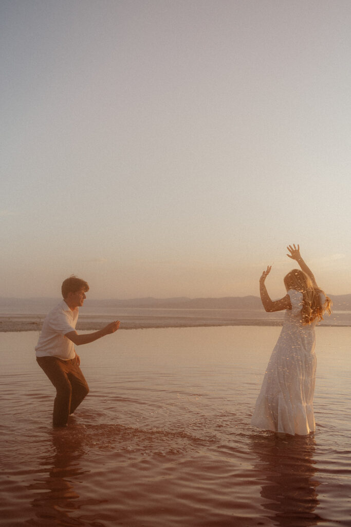 fun couple session at the beach