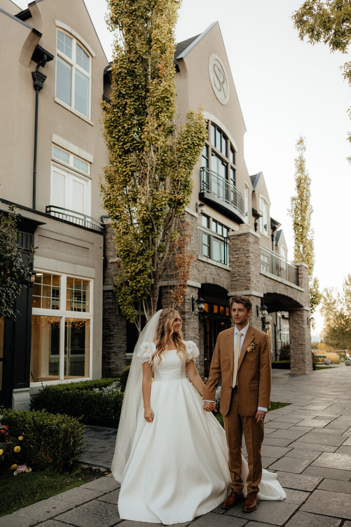 couple walking around their wedding venue