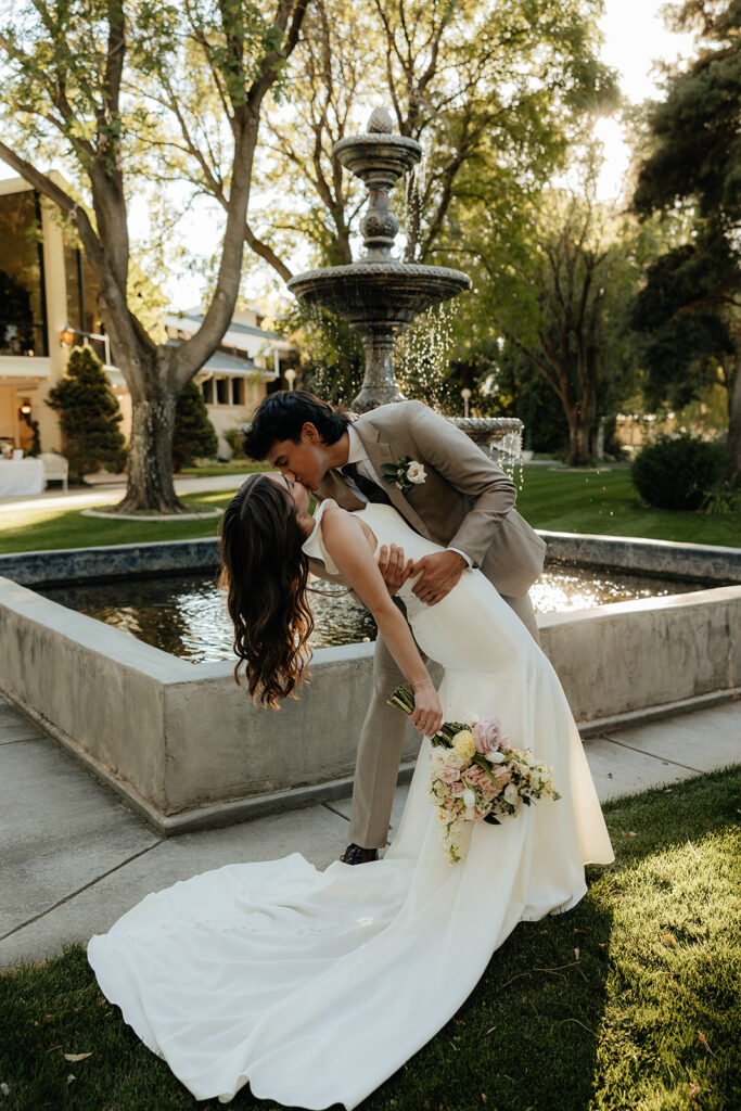 cute couple kissing during their bridal session