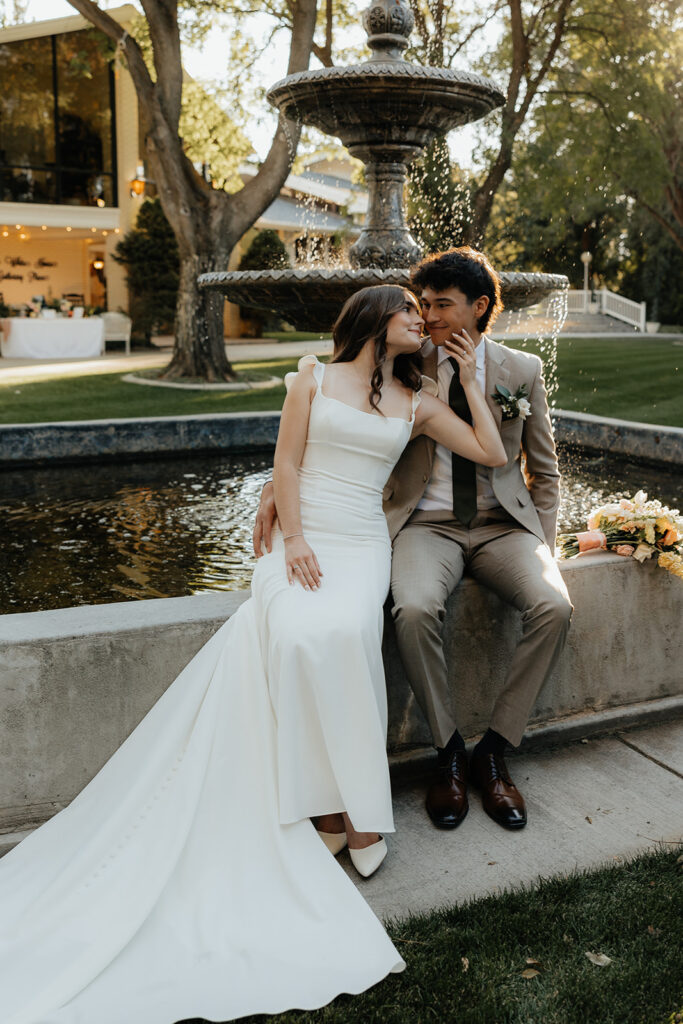 bride kissing the groom on the cheek