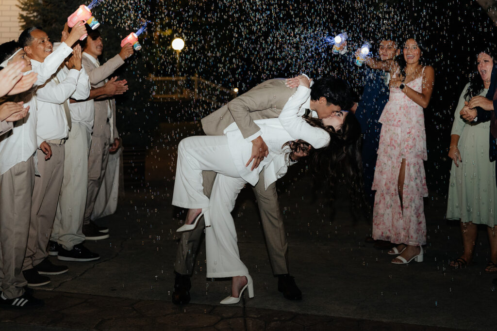 cute picture of the newlyweds kissing