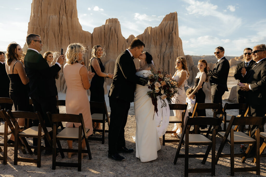 cute picture of the newlyweds kissing