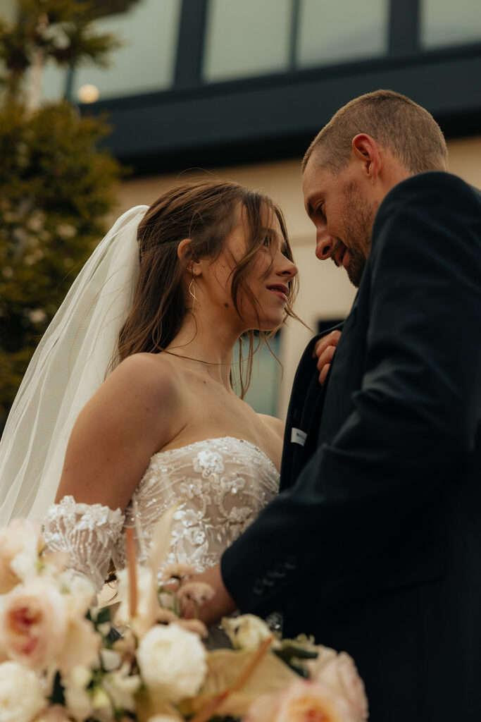 couple laughing with each other during their bridal portraits