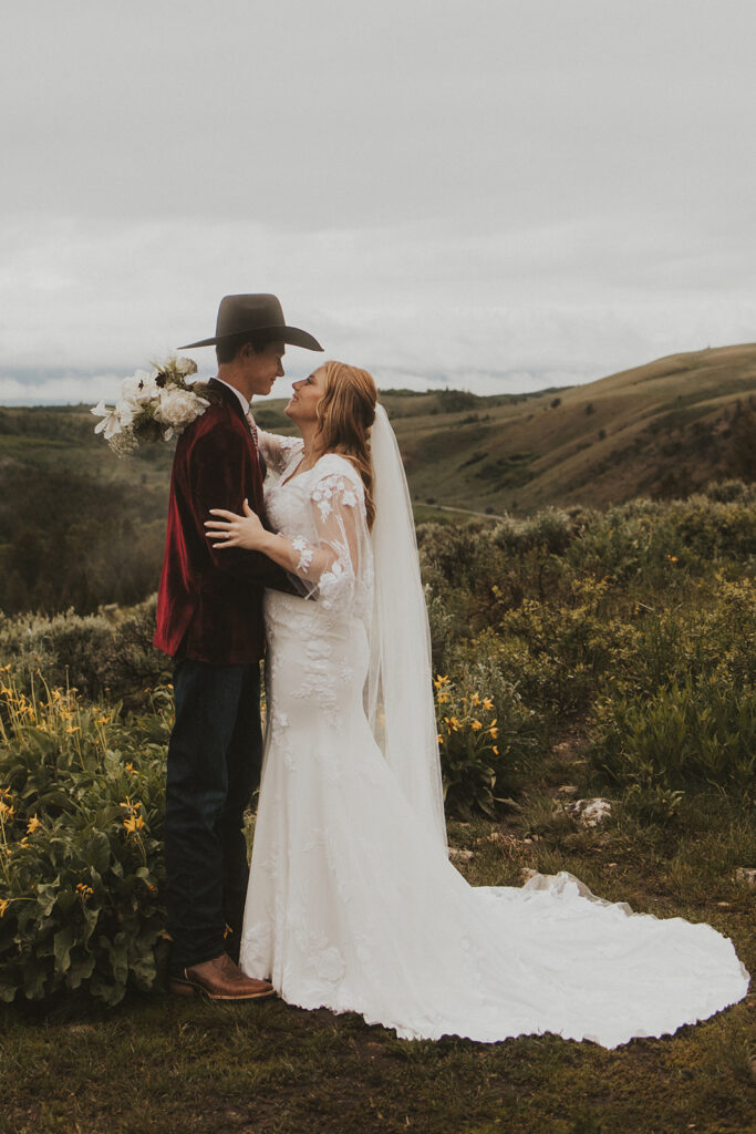 picture of the bride and groom hugging