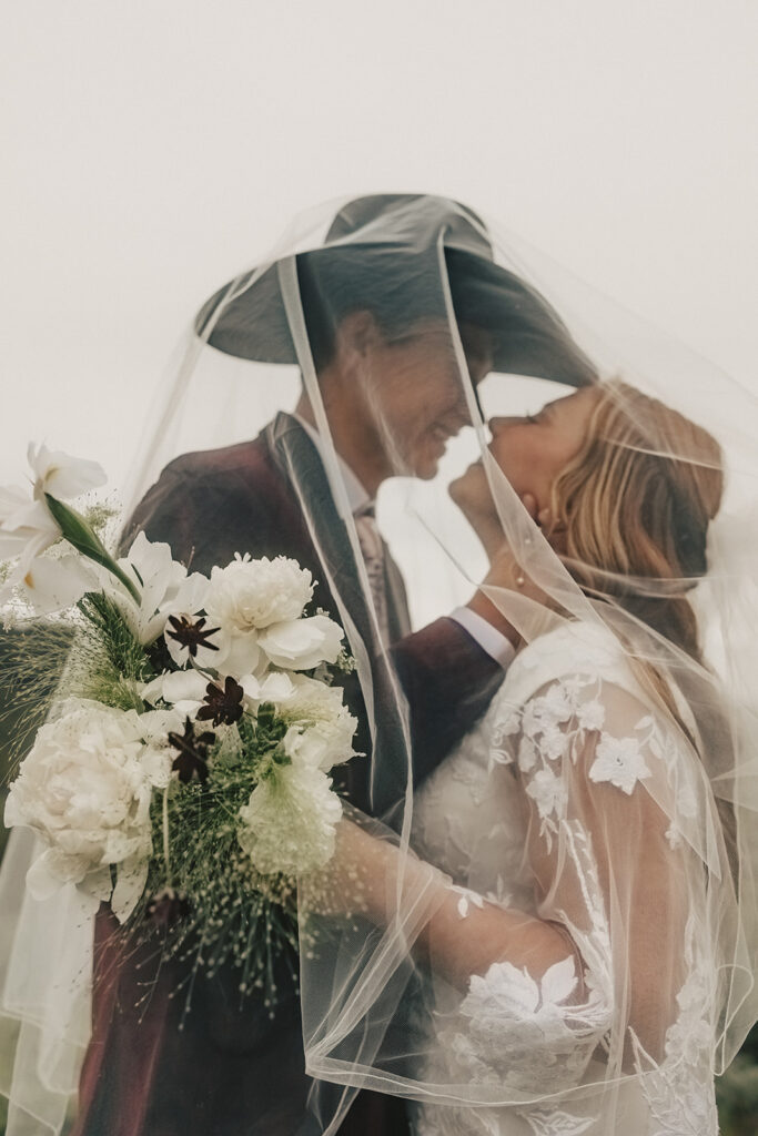 picture of the newlyweds smiling with each other