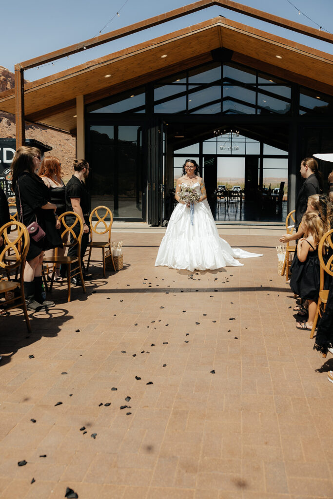 stunning picture of the bride walking down the aisle