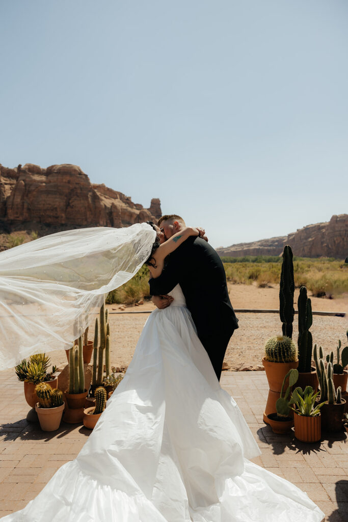 couple kissing after their ceremony