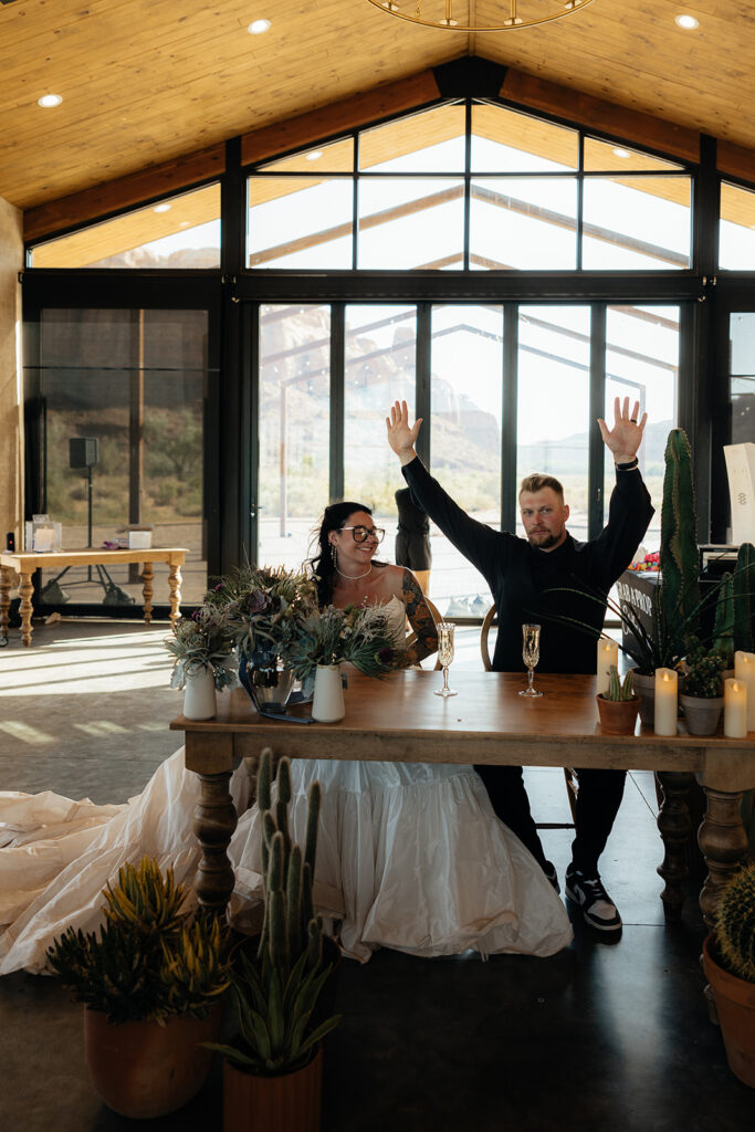 couple celebrating their marriage with champagne