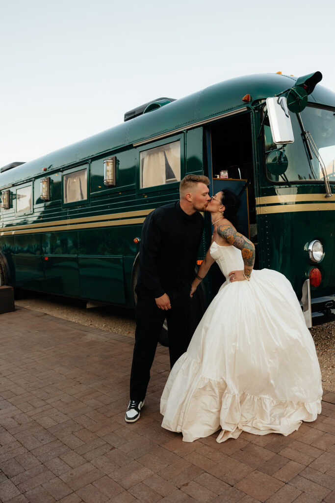 portrait of the newly married couple kissing