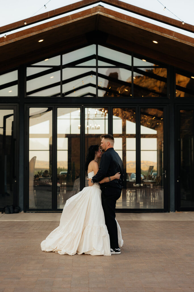Cute picture of the newly married couple hugging