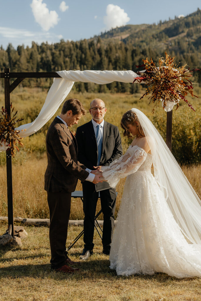 bride and groom emotional at their ceremony
