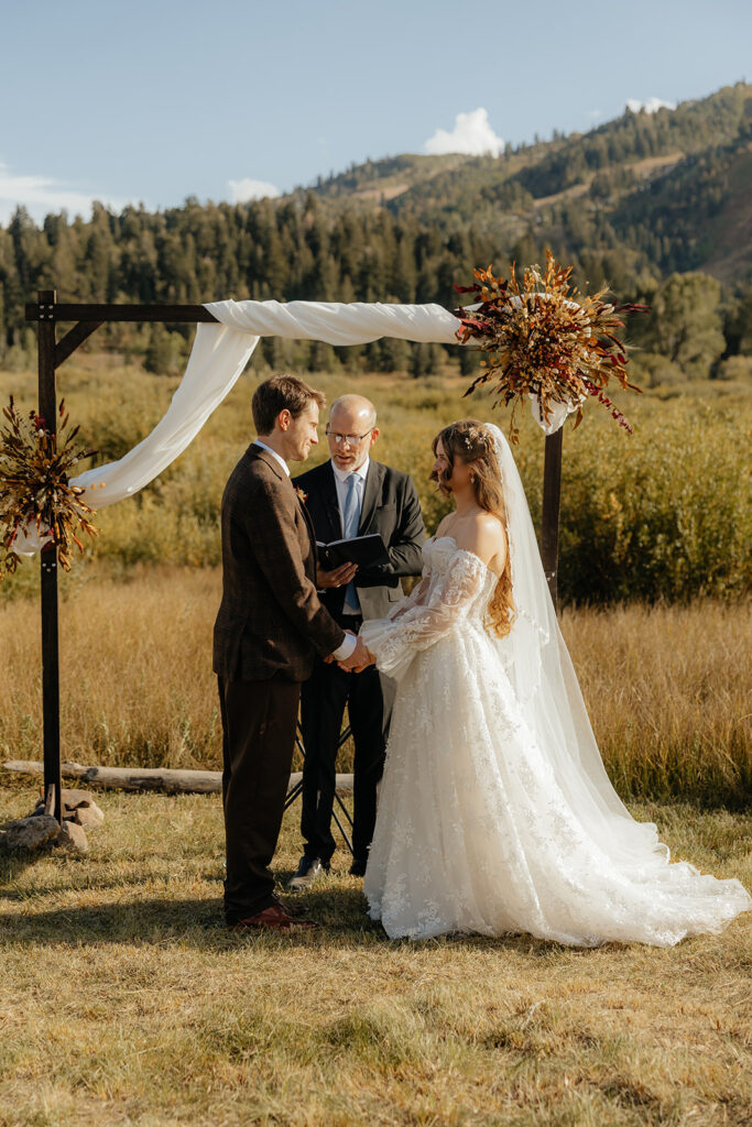 bride and groom at their golden hour ceremony