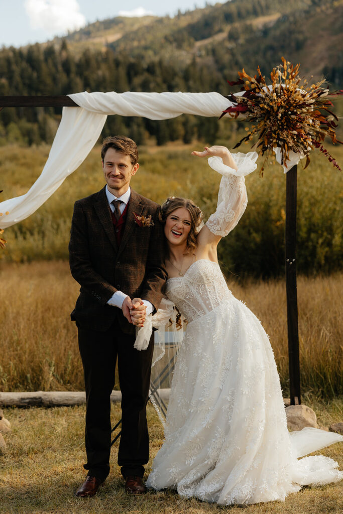 happy couple before heading to their reception