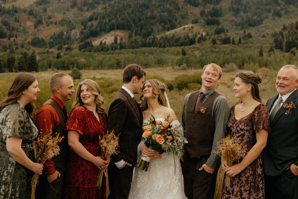 picture of the bride and groom with their bridal parties
