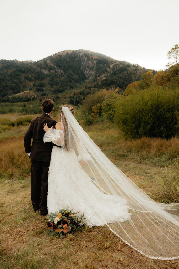 bride kissing the groom on the cheek