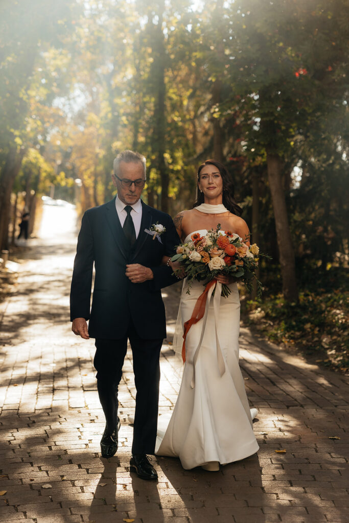 stunning picture of the bride waling down the aisle