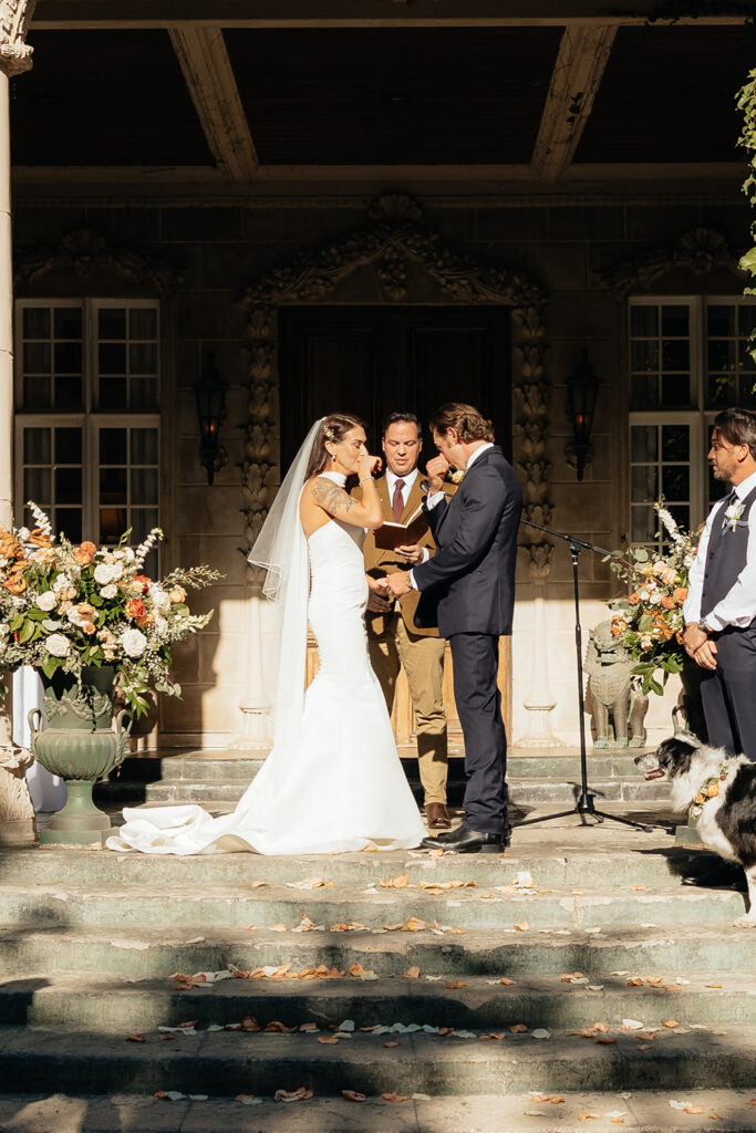 bride and groom emotional at their wedding ceremony