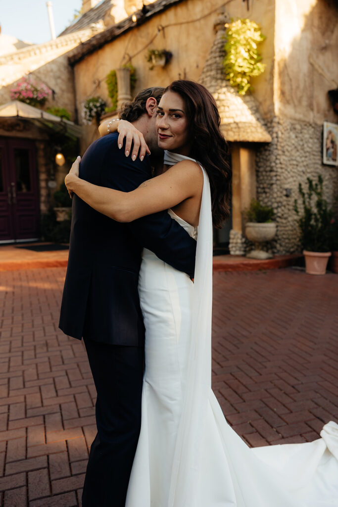 cute picture of the newlyweds hugging