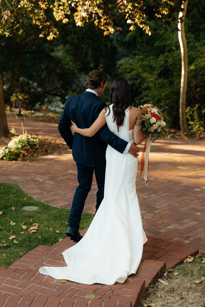 cute picture of the newlyweds heading to their reception