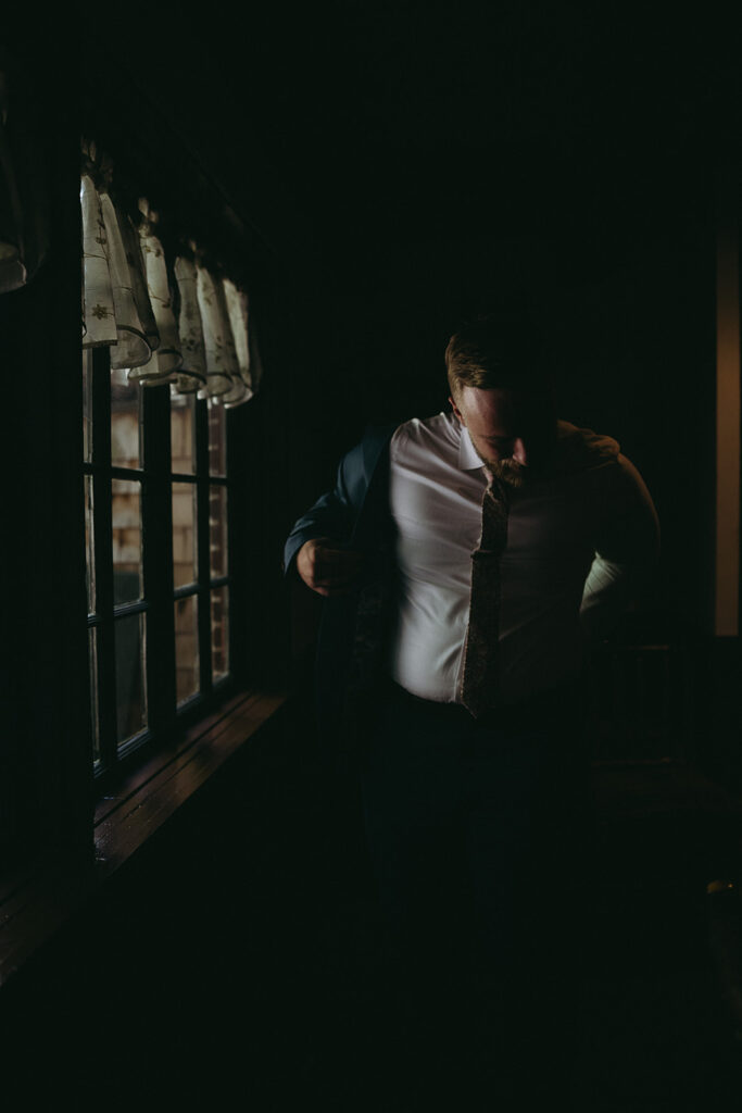 groom getting ready for his wedding ceremony