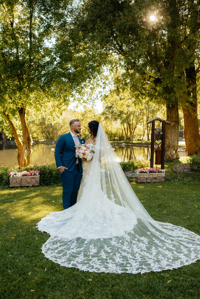 portrait of the newlyweds smiling at each other