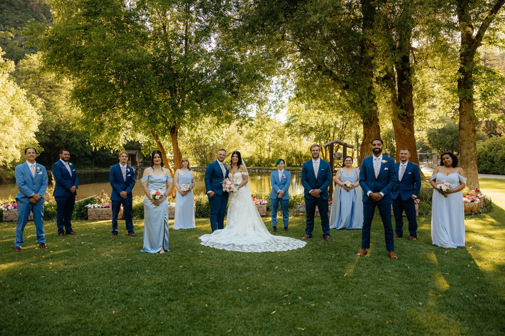 stunning portrait of the newlyweds with their bridal parties